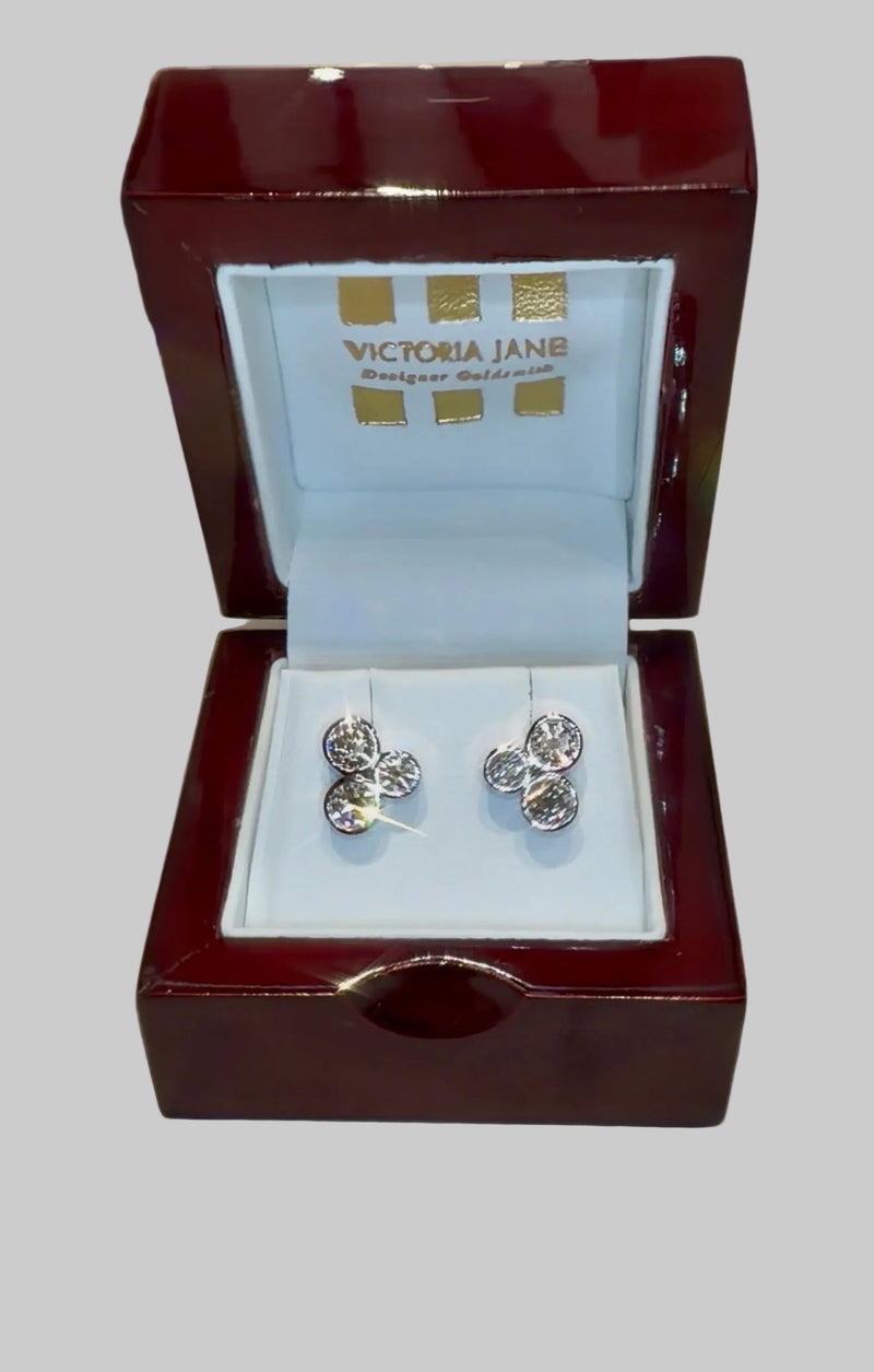 'Trilogy' an exceptional pair of platinum and diamond stud earrings